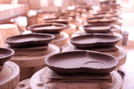 Blocks of Handmade Ceramic pottery in the local workshop, Thailand.の写真素材