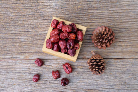 Top view of Dried red date or Chinese jujube on wooden tableの写真素材