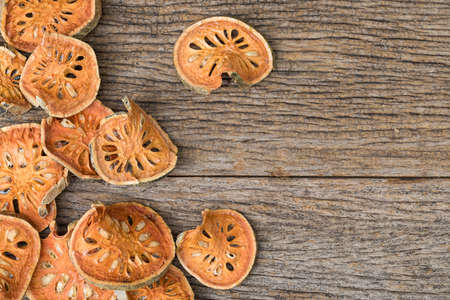 Dried quince on wooden tableの写真素材