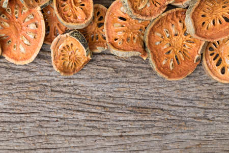 Dried quince on wooden tableの写真素材