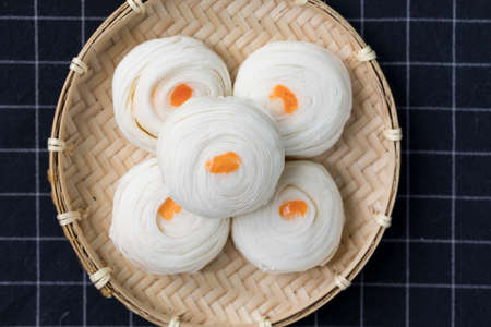 Close up shot of Chinese pastry mung bean with egg yolk (Moon cake), a popular asian dessert,...