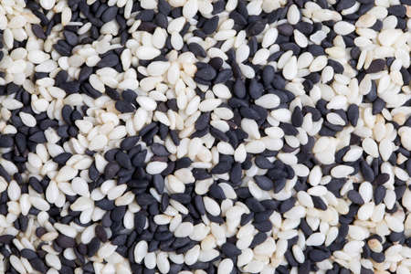 Black Sesame and White Sesame Background, close up