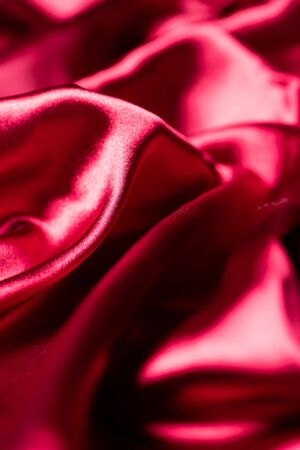 Red smooth elegant satin texture, can be used as abstract designの写真素材