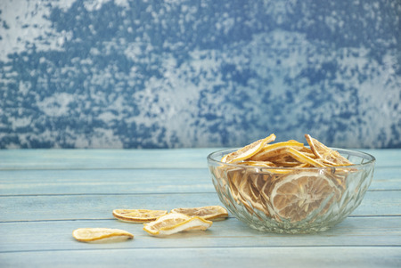 a bowl of dried sliced lemonの写真素材