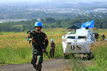 BOGOR, INDONESIA - MAY, 2012: Soldiers skilled in military trainingのeditorial素材