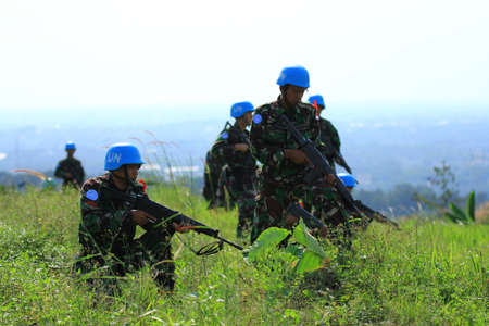 BOGOR, INDONESIA - MAY, 2012: Soldiers skilled in military trainingのeditorial素材