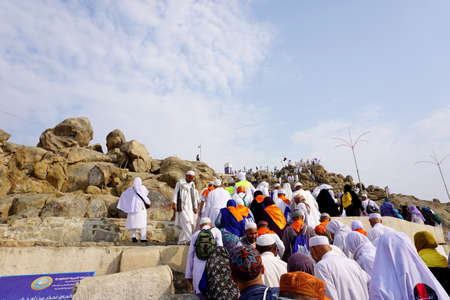 MAKKAH, SAUDI ARABIA - SEPTEMBER, 2016: pilgrims climb Mount Rahmah during the Hajj season