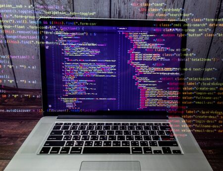 Program source code that is ejected from the laptop screenWhich programmers can develop into...