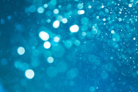 Abstract blue bokeh backgroundの写真素材