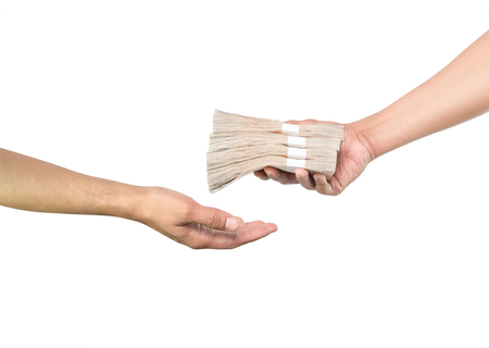 hands giving money isolated on white background with clipping pathの写真素材