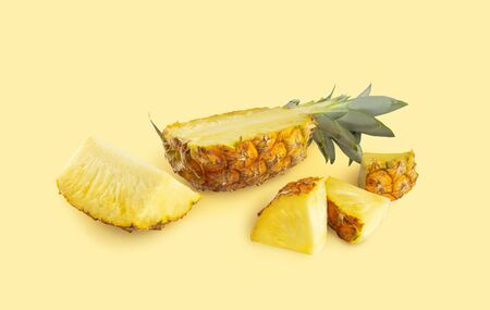 Isolated set of pineapple on yellow bacground
