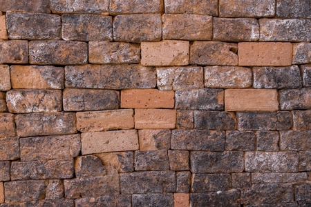 vintage orange brick wall texture backgroundの写真素材