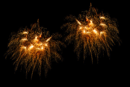 x'mas and happy new year golden firework celebrate on isolated backgroundの写真素材