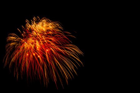 Celebration-red and yellow fireworks fastival on isolated backgroundの写真素材