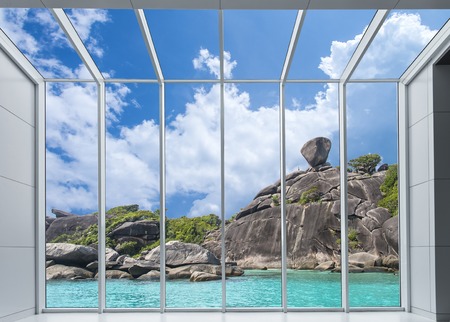 view cityscape from Aluminum frame windows and clear glass, Beautiful crystal clear sea at tropical paradise island, Similan islandの写真素材