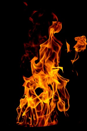 Fire flames on black backgroundの写真素材