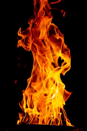 yellow Fire flame isolated on black background