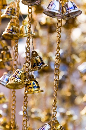 23 Oct. 2016, Bangkok, Thailand, Bell group, Gold and silver Bell praying by write name on ell in temple, Bangkok , Thailandのeditorial素材