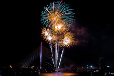 Beautiful colorful firework display for celebration happy new year and merry christmas in the night sky, bangkok city, thailandの写真素材