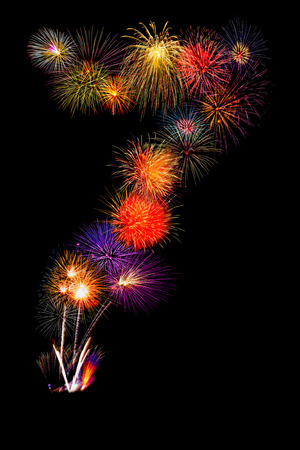 colorful fireworks number 7  for 2017 -  beautiful colorful firework isolated display for celebration happy new year and merry christmas on black isolated backgroundの写真素材