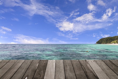 wooden balcony / terrace, Beautiful tropical blue sky sea and blue sky and white cloudの写真素材