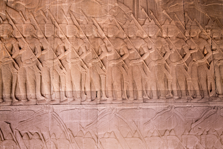 Scene of the Churning of the Milk Ocean carvings status on the wall of Angkor wat temple, world heritage, Siemreap, Cambodiaの写真素材