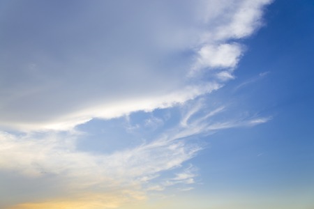 Blue sky with closeup white fluffy clouds background and patternの写真素材
