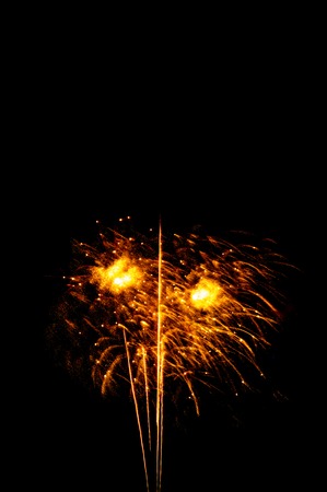 fireworks new year celebrate -  beautiful colorful firework isolated display with light reflex in water display for celebration happy new year and merry christmas on black isolated backgroundの写真素材