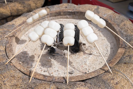 Grill dango, Japanese Dessert - Japanese style sticky rice ball dumpling on stoveの写真素材