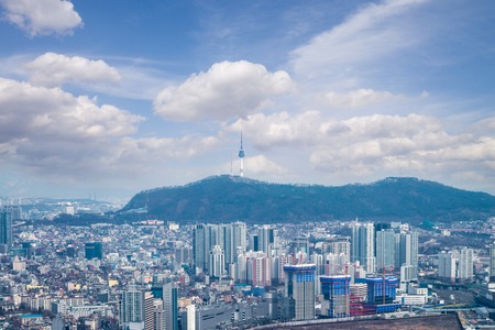 downtown of high rise  modern office buildings and skyscrapers in Seoul city with blue sky and cloud  from  top view in winter season, Seoul, Republic of Koreaの写真素材