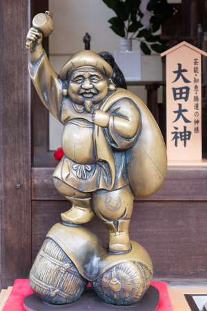 Kyoto, Japan novemer 24, 2016: The Ebisu brass statue in Kiyomizu-dera Temple, kyoto, Japan. Ebisu is iconic Japanese God of Good Luck and  one of The Seven Gods of fortuneのeditorial素材