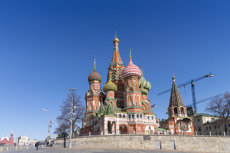 Moscow,Russia, St. Basil's Cathedral and Kremlin Walls and Tower in Red square in sunny blue sky. Red square is Attractions popular's touris in russiaの写真素材