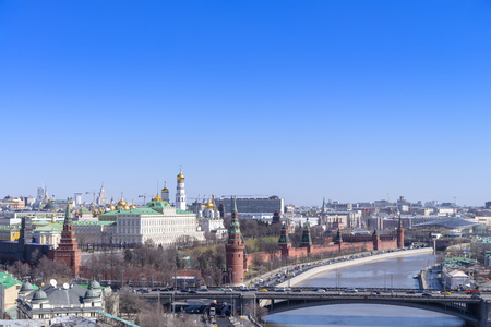 view of Moscow cityscape, old historical town and urban skyscrapers (Moscow International Business Center background) with sunny blue sky, Moscow city, Russiaの写真素材
