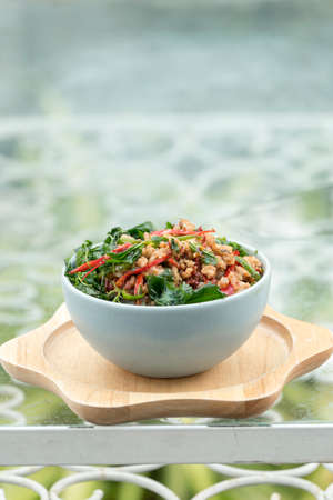 Stir fried minced pork with basil leaves on  thai jasmin rice , thai street foodの写真素材