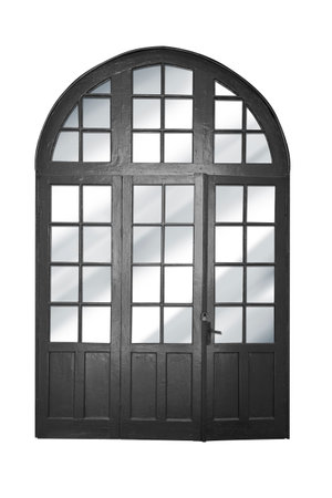 black traditional style wooden door on white backgroundの写真素材