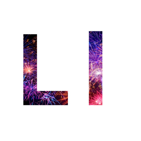 Letter L made from celebration happy new year and merry christmas firework isolated on black isolated backgroundの写真素材