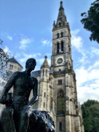 Statue in front of a church in Stuttgart. の素材