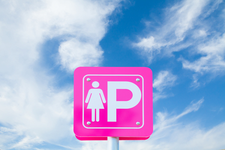 Lady parking metal sign on blue sky background.clipping path. copy space of your textの写真素材
