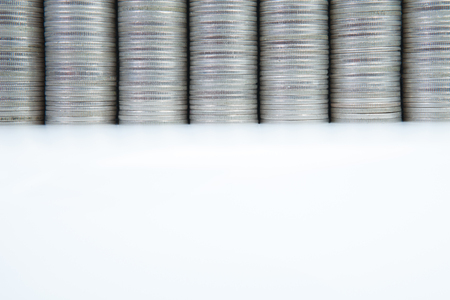 castle wall of Coins stack on white background の写真素材