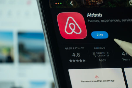Dhaka, Bangladesh- 21 Nov 2025: A iPad screen displaying the Airbnb app on App store.のeditorial素材