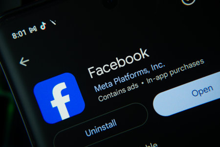 Dhaka, Bangladesh- 27 July 2025: Screen displaying Facebook app with open and uninstall options, dark interfaceのeditorial素材
