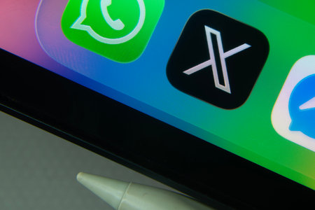 16 Nov 2025- Dhaka, Bangladesh: X and other app icons with a digital pen on a iPad screen.
