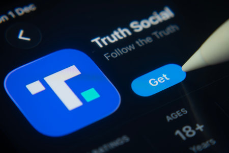 Dhaka, Bangladesh- 01 Dec 2025: A close-up of the Truth Social app icon in the App Store on an iPad screen.のeditorial素材