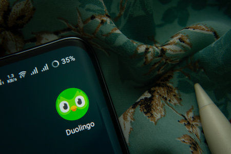Dhaka, Bangladesh- 03 Oct 2025: Duolingo app icon is seen on smartphone.のeditorial素材