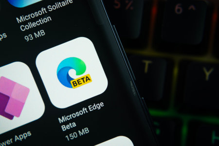 Dhaka, Bangladesh- 27 July 2025: Close-up of smartphone screen showing the Microsoft Edge Beta app icon with a dark interface.のeditorial素材