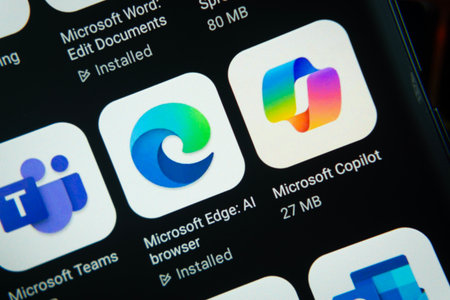 Dhaka, Bangladesh- 27 July 2025: Close-up of smartphone screen showing the Microsoft Edge, Microsoft Copilot, Microsoft Teams app icon with a dark interface.のeditorial素材