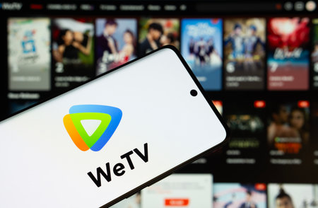 Dhaka, Bangladesh- 28 July 2025: WeTV logo is displayed on a smartphone screen, with the website is...