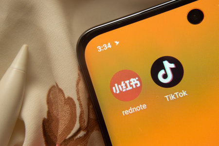 Dhaka, Bangladesh- 07 May 2025: Tiktok and rednote app icon is seen on smartphone.