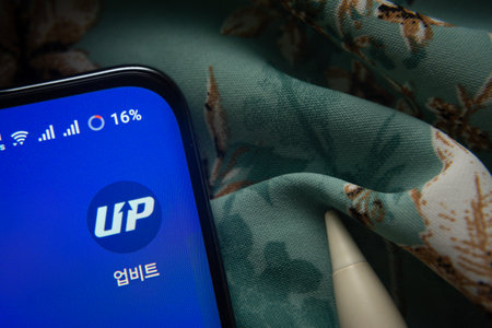 Dhaka, Bangladesh- 07 May 2025: Upbit app icon is seen on smartphone.