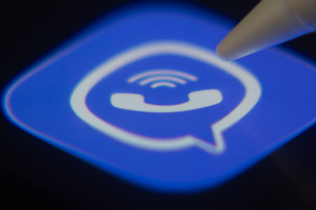 Dhaka, Bangladesh- 06 Dec 2025: Close-up of the Rakuten Viber app on a screen with a stylus pointing at it.のeditorial素材